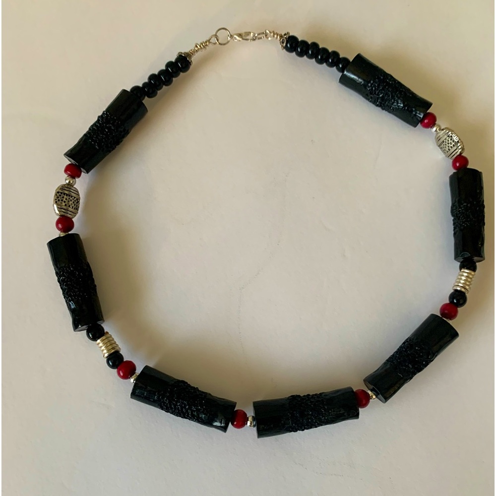 Black necklace with red and silver beads